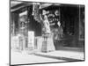 Cigar Store Indian Outside Shop-null-Mounted Photographic Print