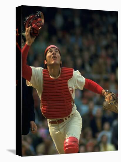 Cincinnati Reds Catcher Johnny Bench Catching Pop Fly During Game Against San Francisco Giants-John Dominis-Stretched Canvas