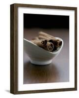 Cinnamon Sticks in Small Bowl-Henrik Freek-Framed Photographic Print