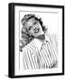 circa, 1942: Portrait of American actor Rita Hayworth (1918 - 1987) wearing a striped shirt (b/w ph-null-Framed Photo