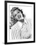 circa, 1942: Portrait of American actor Rita Hayworth (1918 - 1987) wearing a striped shirt (b/w ph-null-Framed Photo