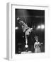 Circus Performer Balancer Unus Standing on His Index Finger on Globe Feet in Air Back of Head-Ralph Morse-Framed Photographic Print