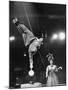 Circus Performer Balancer Unus Standing on His Index Finger on Globe Feet in Air Back of Head-Ralph Morse-Mounted Photographic Print