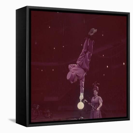 Circus Performer Balancing on Forefinger-Ralph Morse-Framed Stretched Canvas