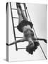 Circus Performer Hanging Upside Down-Cornell Capa-Stretched Canvas