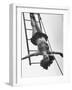 Circus Performer Hanging Upside Down-Cornell Capa-Framed Photographic Print