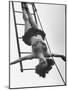 Circus Performer Hanging Upside Down-Cornell Capa-Mounted Photographic Print