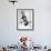 Circus Performer Hanging Upside Down-Cornell Capa-Framed Photographic Print displayed on a wall