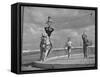 Circus Performers Practicing Stunt-Cornell Capa-Framed Stretched Canvas