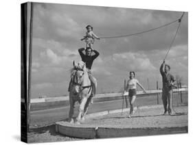 Circus Performers Practicing Stunt-Cornell Capa-Stretched Canvas