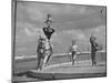 Circus Performers Practicing Stunt-Cornell Capa-Mounted Photographic Print