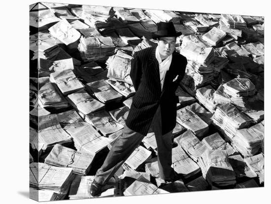 Citizen Kane, Orson Welles, 1941, Astride Stacks Of Newspaper-null-Stretched Canvas