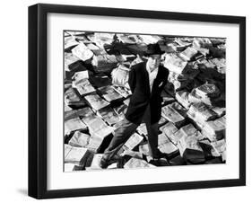 Citizen Kane, Orson Welles, 1941, Astride Stacks Of Newspaper-null-Framed Photo