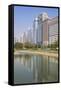 City Center Buildings Reflecting in Corniche Lake, Abu Dhabi, United Arab Emirates, Middle East-Jane Sweeney-Framed Stretched Canvas