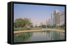 City Center Buildings Reflecting in Corniche Lake, Abu Dhabi, United Arab Emirates, Middle East-Jane Sweeney-Framed Stretched Canvas