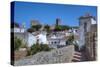 City overview with Wall and Medieval Castle in the background, Obidos, Portugal, Europe-Richard Maschmeyer-Stretched Canvas