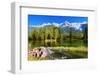 City Park in the Alpine Resort of Chamonix. Cold Lake Surrounded by Trees and Snow-Capped Mountains-kavram-Framed Photographic Print