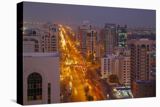 City Skyline and Rashid Bin Saeed Al Maktoum Street at Dusk-Frank Fell-Stretched Canvas