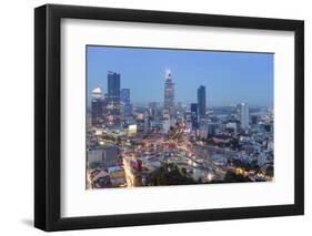 City skyline at night showing the Bitexco tower, Ho Chi Minh City (Saigon), Vietnam, Indochina, Sou-Alex Robinson-Framed Photographic Print