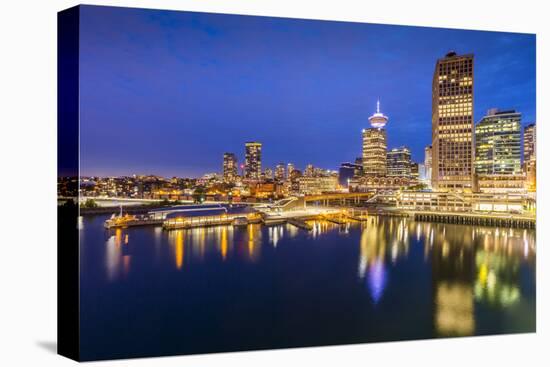 City skyline including Vancouver Lookout Tower as viewed from Canada Place at dusk, Vancouver, Brit-Frank Fell-Stretched Canvas