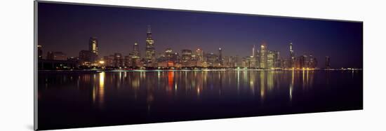 City skyline reflecting in Lake Michigan at night, Chicago, Illinois, USA-Panoramic Images-Mounted Photographic Print