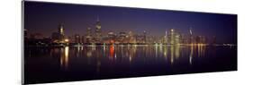 City skyline reflecting in Lake Michigan at night, Chicago, Illinois, USA-Panoramic Images-Mounted Photographic Print