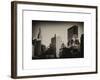 Cityscape with the Empire State Building and the New Yorker Hotel-Philippe Hugonnard-Framed Art Print