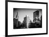 Cityscape with the Empire State Building and the New Yorker Hotel-Philippe Hugonnard-Framed Art Print