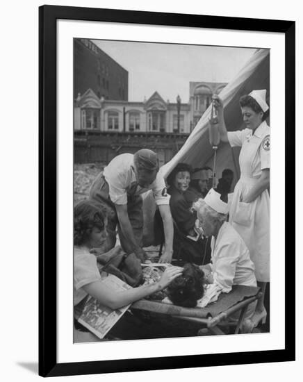 Civilian Receiving a Blood Transfusion from the British Red Cross Setup in a Tent-Allan Grant-Framed Photographic Print