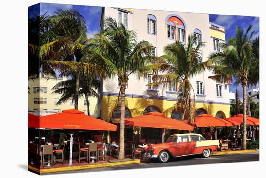 Classic Car in front of the Paparazzi Restaurant, Ocean Drive-null-Stretched Canvas