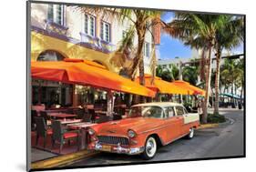 Classic Car in front of the Paparazzi Restaurant, Ocean Drive-null-Mounted Art Print