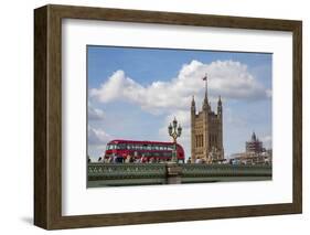Classic double decker tour bus in London, England crossing the bridge River Thames-Michele Niles-Framed Photographic Print