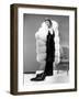 Claudette Colbert, in Travis Banton Gown and White Fox Fur Coat, c.1935-null-Framed Photo