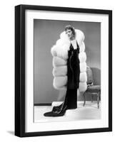 Claudette Colbert, in Travis Banton Gown and White Fox Fur Coat, c.1935-null-Framed Photo