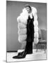 Claudette Colbert, in Travis Banton Gown and White Fox Fur Coat, c.1935-null-Mounted Photo
