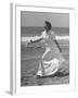 Claudette Colbert in Zippered, Terry Cloth Beach Robe, Sashaying Along Surf at Santa Monica Beach-Peter Stackpole-Framed Premium Photographic Print