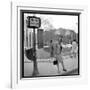 Claudia Cardinale Waiting Near the Champs-Elysées Roundabout, April 1964-Marcel Begoin-Framed Photographic Print