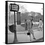 Claudia Cardinale Waiting Near the Champs-Elysées Roundabout, April 1964-Marcel Begoin-Stretched Canvas