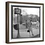 Claudia Cardinale Waiting Near the Champs-Elysées Roundabout, April 1964-Marcel Begoin-Framed Photographic Print