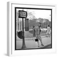 Claudia Cardinale Waiting Near the Champs-Elysées Roundabout, April 1964-Marcel Begoin-Framed Photographic Print