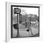 Claudia Cardinale Waiting Near the Champs-Elysées Roundabout, April 1964-Marcel Begoin-Framed Photographic Print