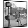 Claudia Cardinale Waiting Near the Champs-Elysées Roundabout, April 1964-Marcel Begoin-Mounted Photographic Print