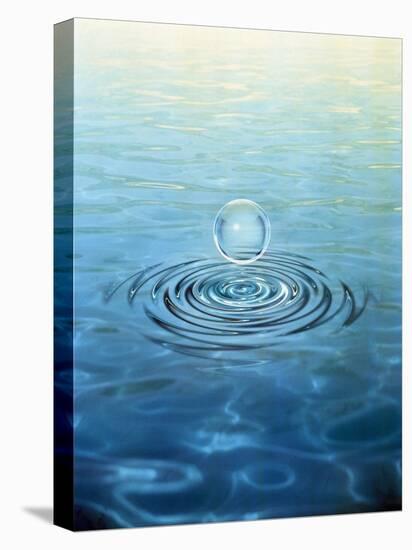 Clear Bubble Floating Above Water Ripples in Choppy Water-null-Stretched Canvas