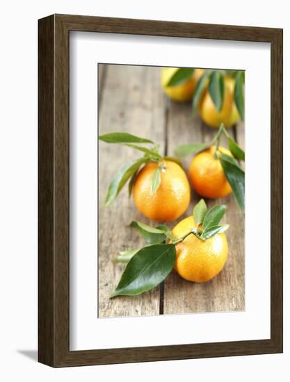 Clementines with Leaves on Wood-Nikky-Framed Photographic Print