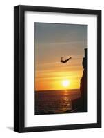 Cliff Diver above Setting Sun-Bob Krist-Framed Photographic Print