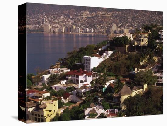 Cliffside Homes on Acapulco Bay, Mexico-Walter Bibikow-Stretched Canvas