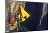 Climber in His Hanging Camp Sleeps on the Side of a Mountain.-Greg Epperson-Mounted Photographic Print