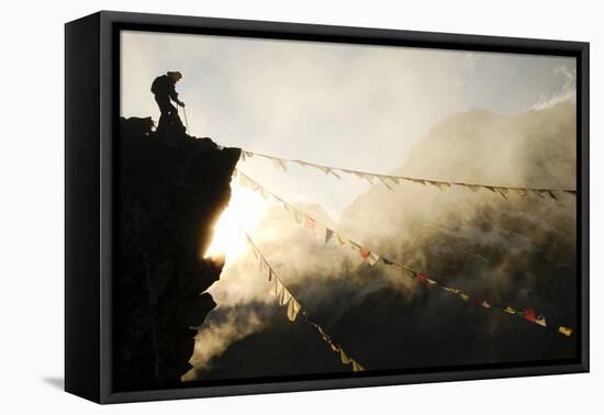 Climber on Kala Pattar Peak (5545M) with Buddhist Prayer Flags at Sunset, Nepal, Himalaya-Enrique Lopez-Tapia-Framed Stretched Canvas