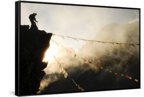 Climber on Kala Pattar Peak (5545M) with Buddhist Prayer Flags at Sunset, Nepal, Himalaya-Enrique Lopez-Tapia-Framed Stretched Canvas