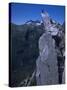 Climber on the Summit of a Rock Tower, Chile-Pablo Sandor-Stretched Canvas